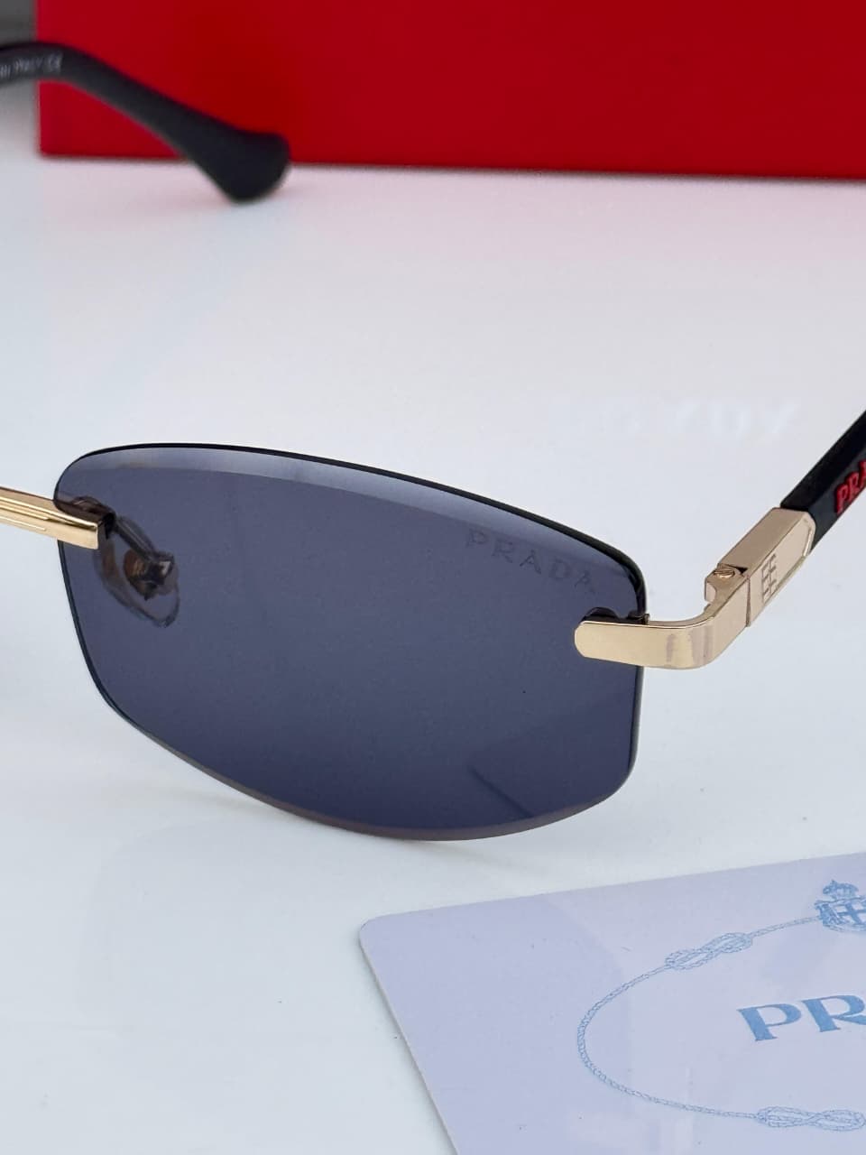 Prada Unisex Black Rimless Rectangle UV Protected Sunglasses