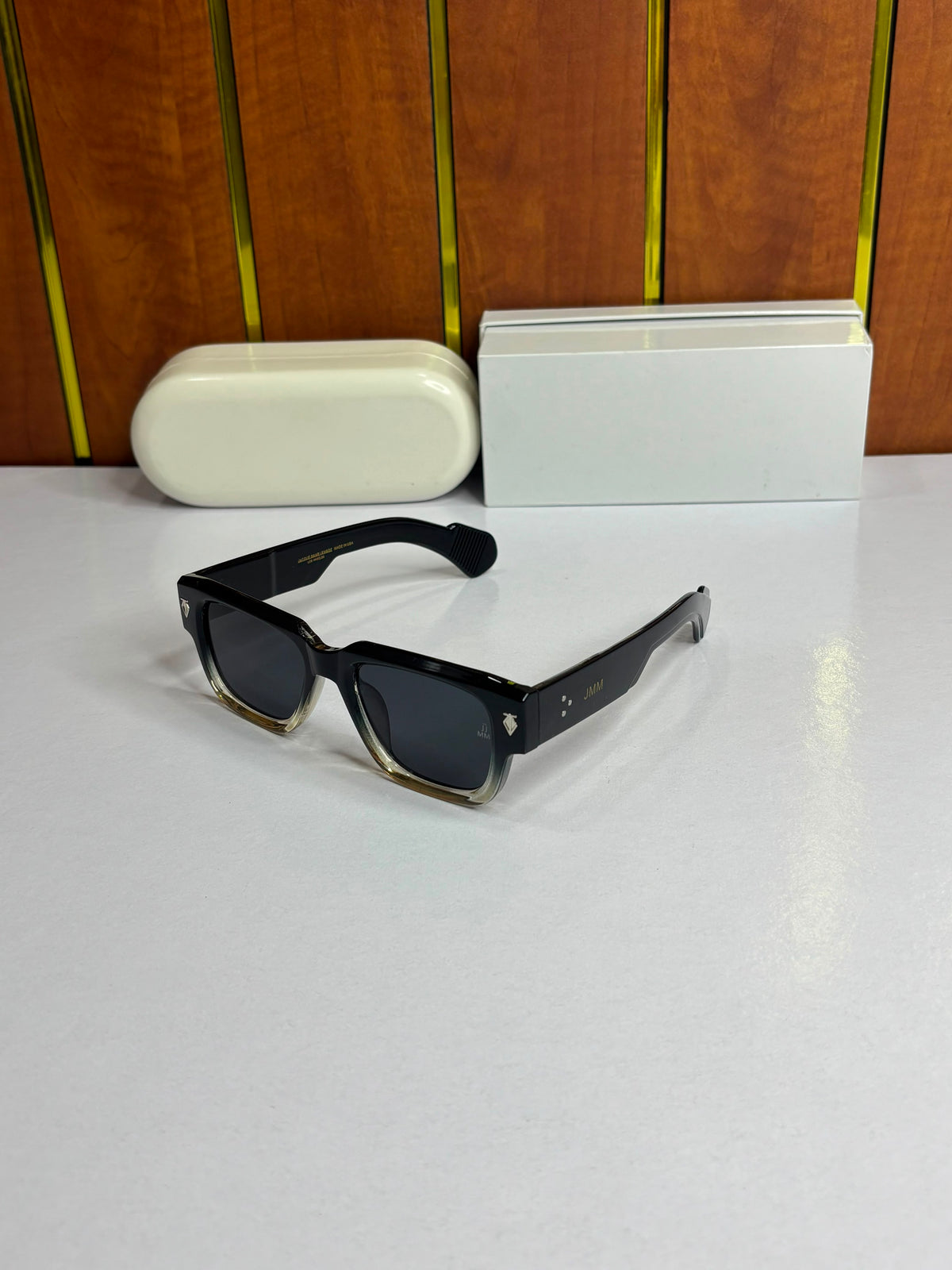 Jacques Marie Mage Molino Unisex sunglasses featuring a bold black-to-clear gradient