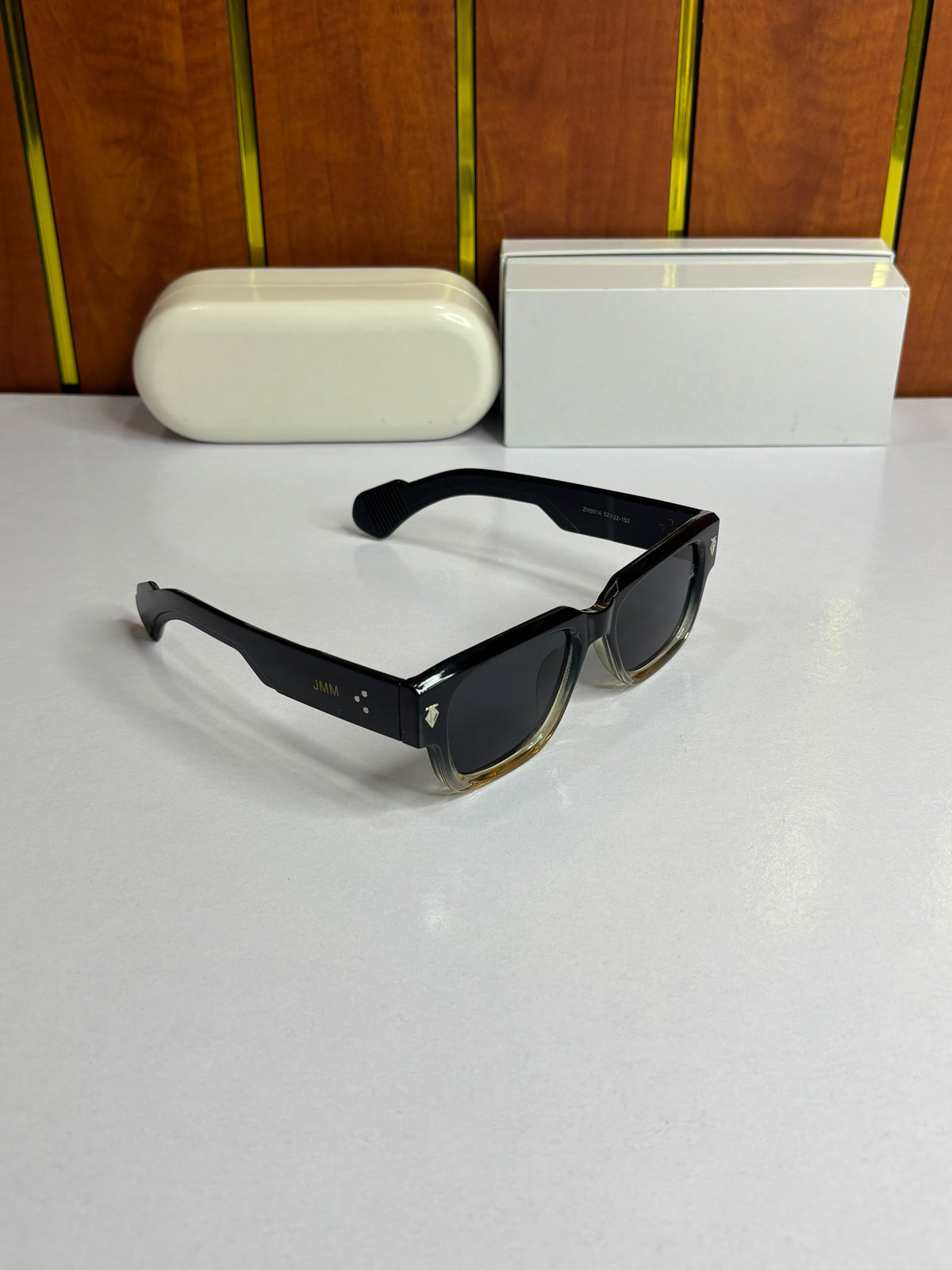 Jacques Marie Mage Molino Unisex sunglasses featuring a bold black-to-clear gradient