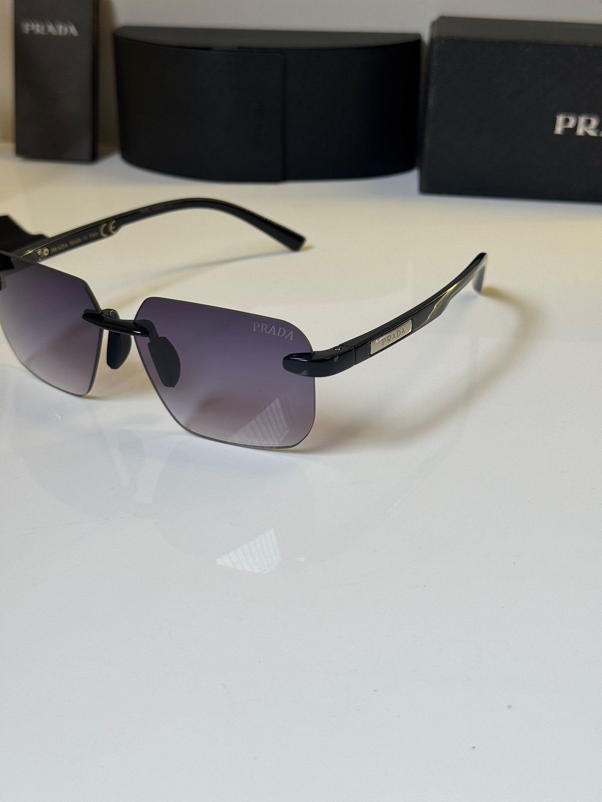Prada Rimless Purple Gradient Tint Unisex Sunglasses