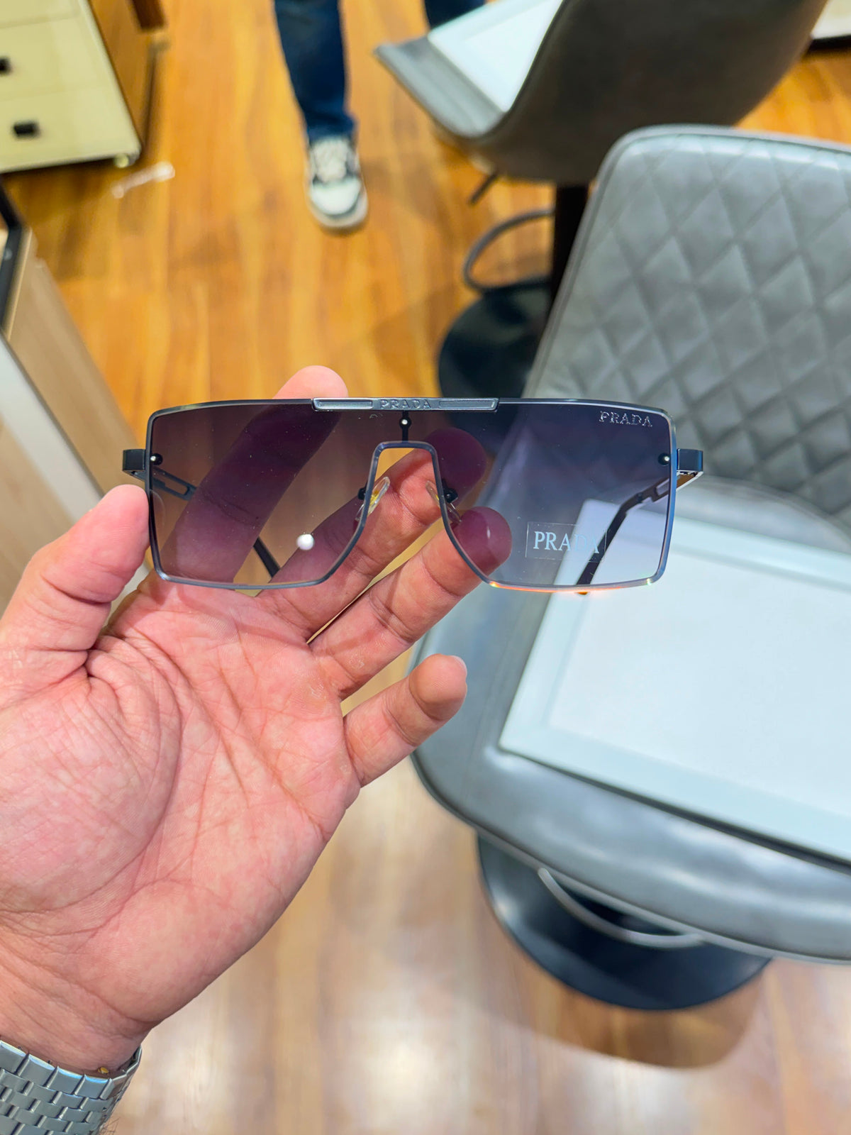 Prada semi-rimless featuring dark gradient lenses Women sunglasses