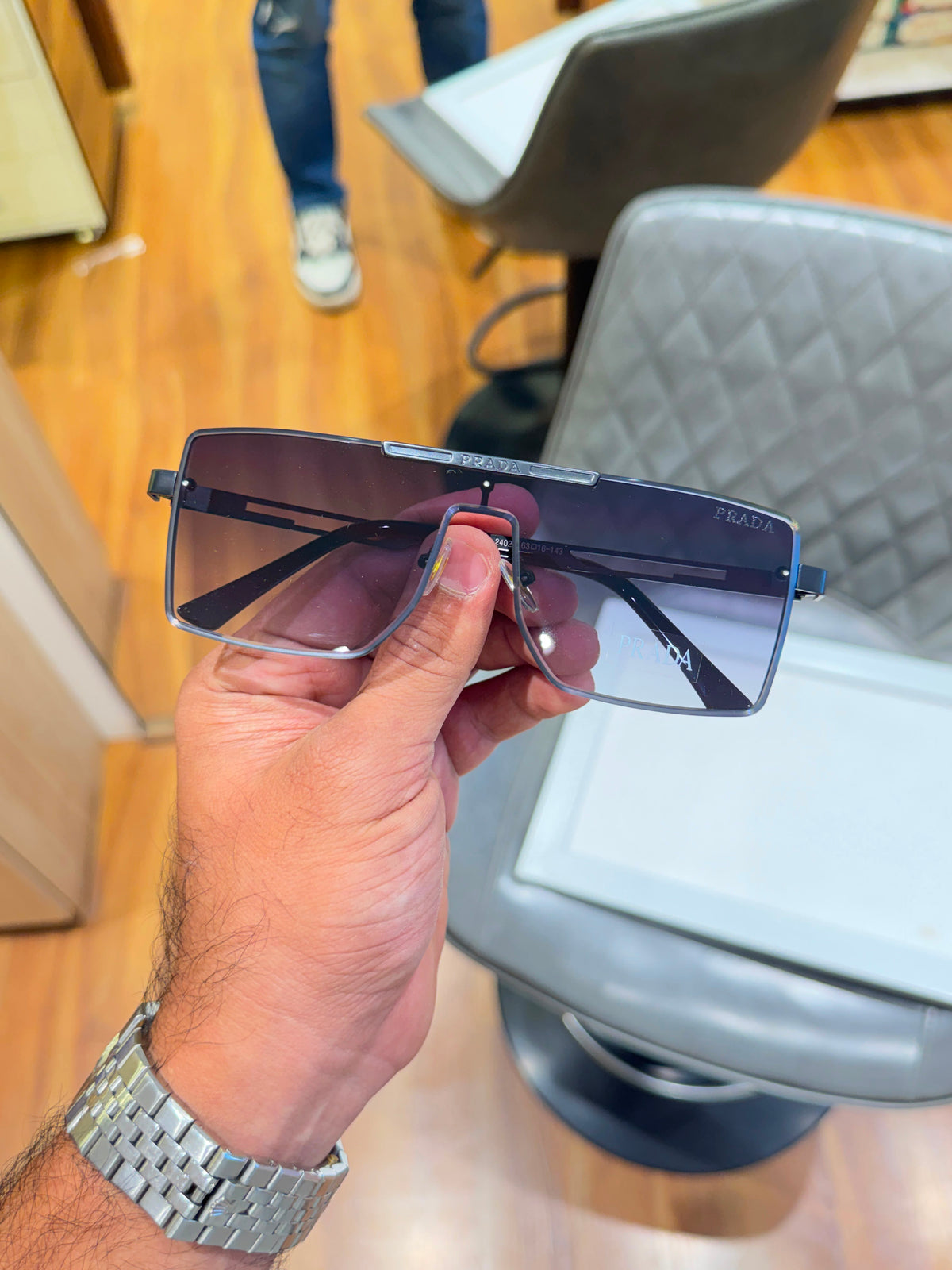Prada semi-rimless featuring dark gradient lenses Women sunglasses